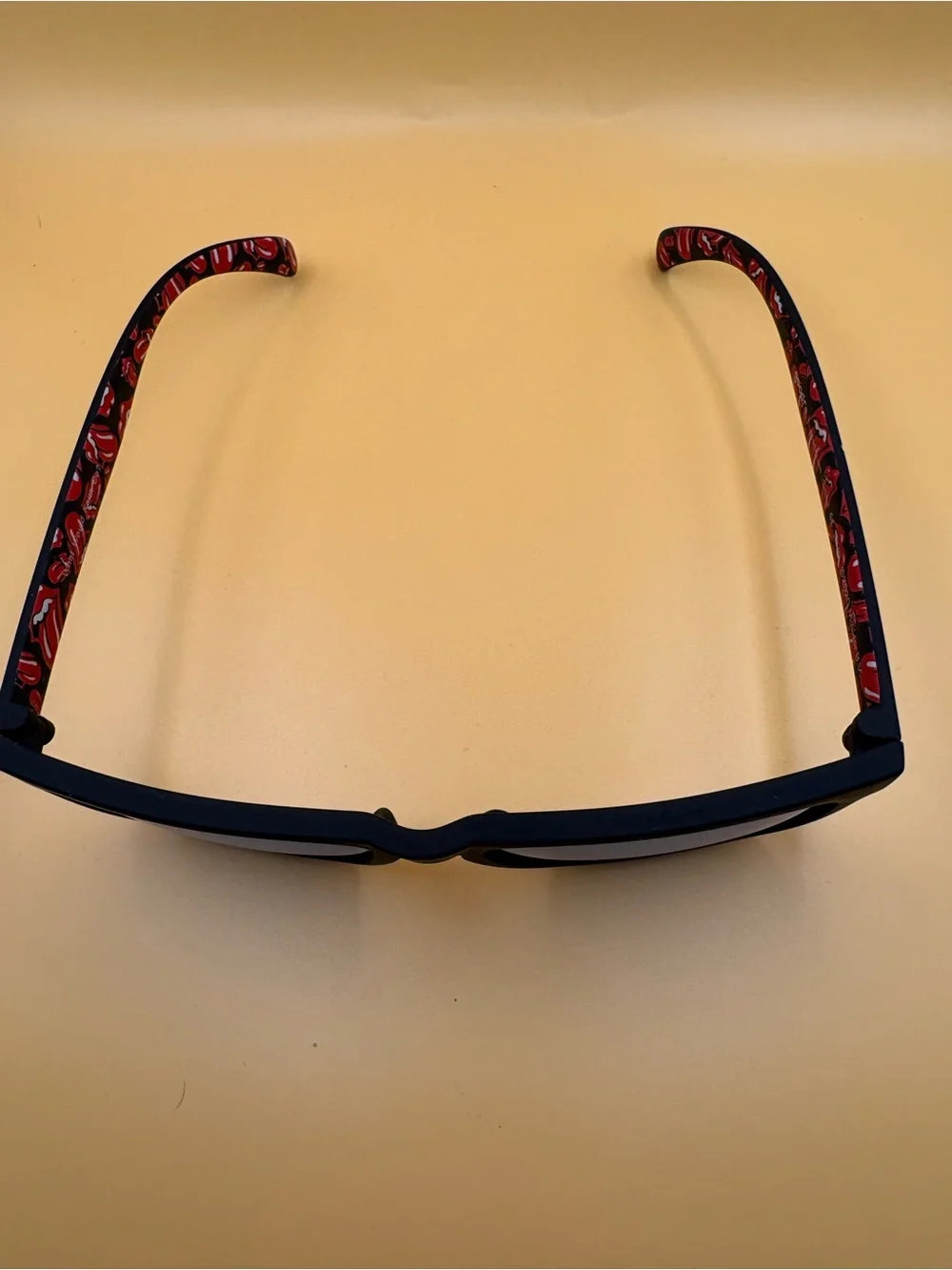 Rolling Stone Sunglasses with Red Patterned Temples with matching pouch